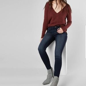 Buckle black skinny jeans